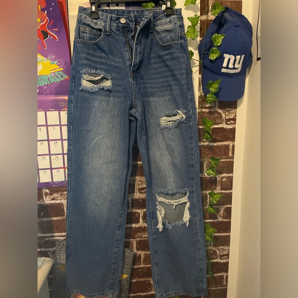 Dark blue ripped jeans